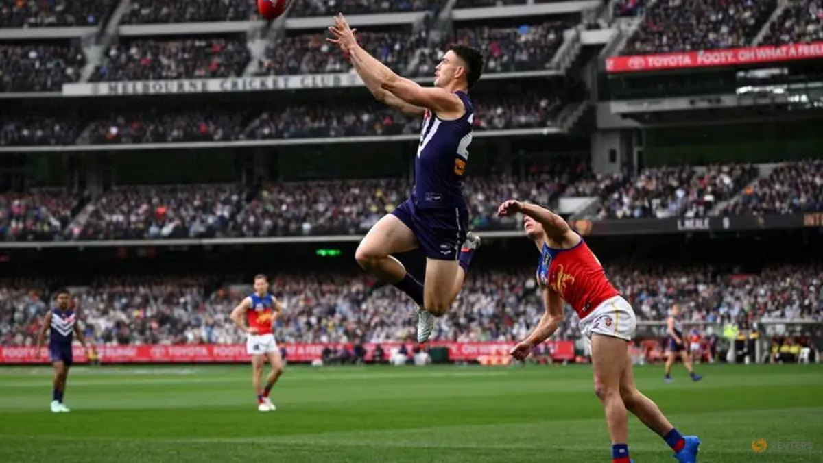 Brisbane Lions beat Fremantle by seven points for third straight premiership